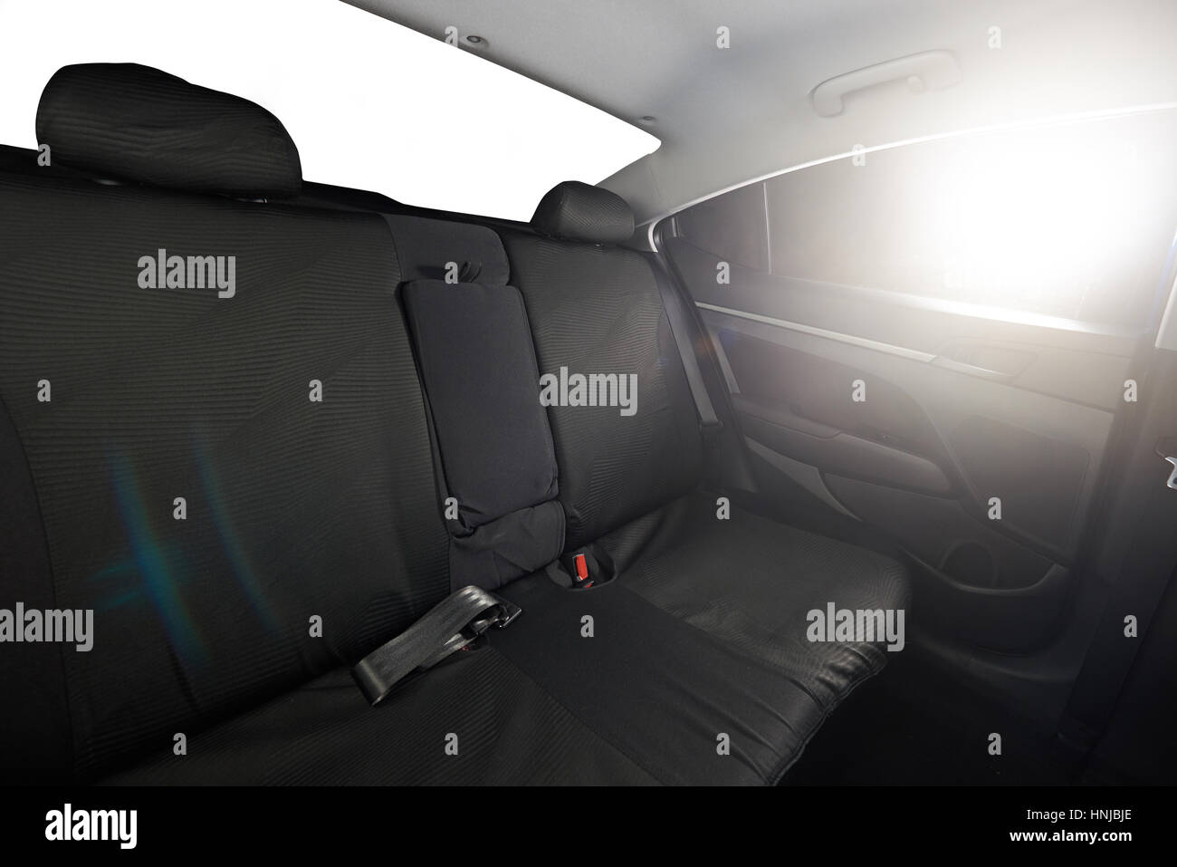 Limousine-Innenraum wieder schwarzes Tuch Sitz mit strahlende Sonne Stockfoto