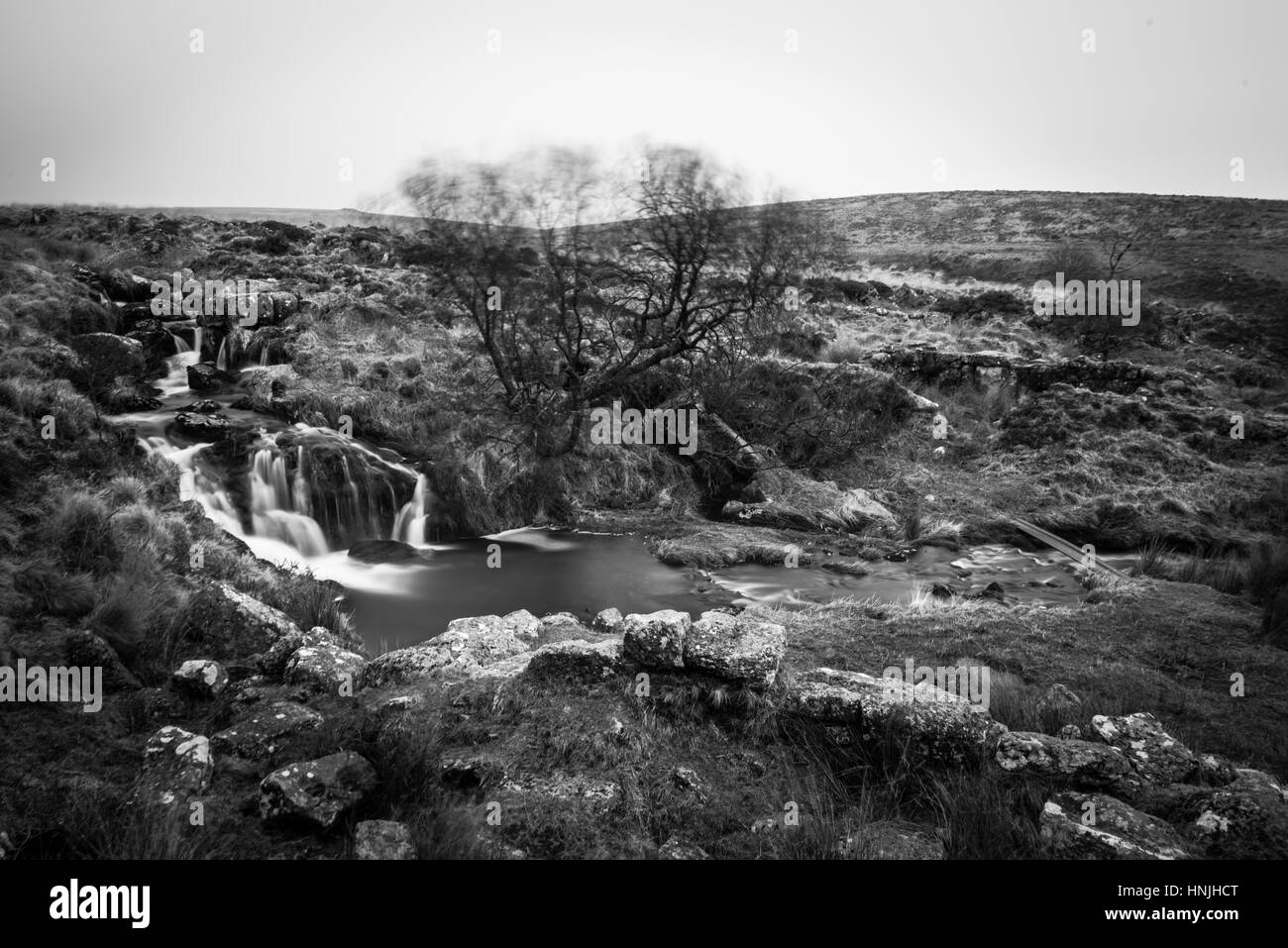 Schwarze Tor fällt auf Dartmoor, Fluß Meavy läuft in Richtung Plymouth über Burrator Reservoir. Stockfoto