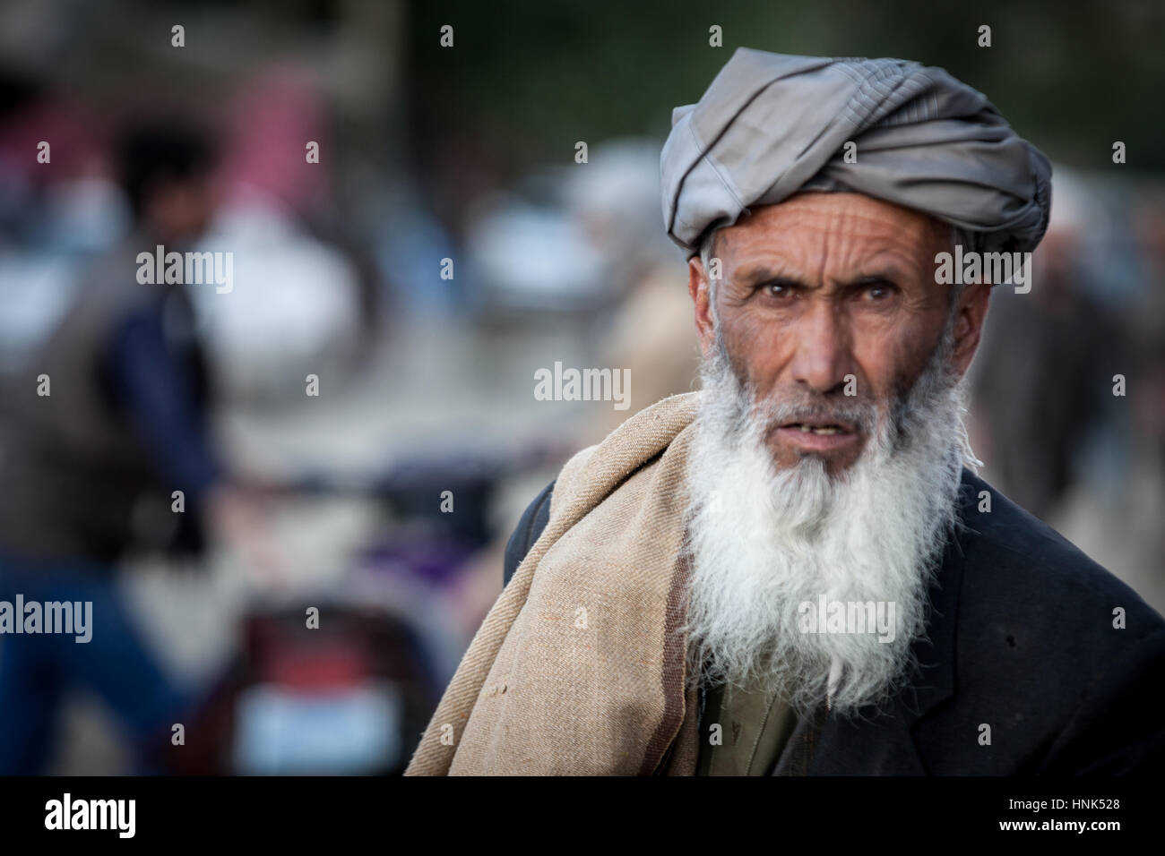 Afghanistan, Wakhan-Korridor, ein Porträt eines Mannes mit langen, weißen Bart und faltigen Gesicht. Stockfoto