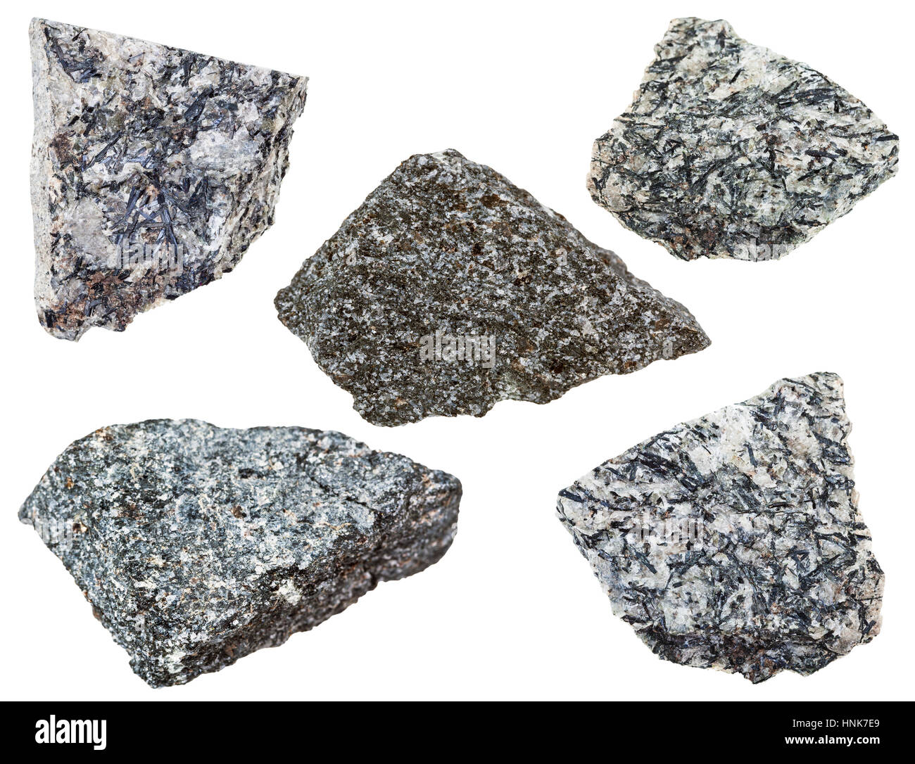 Sammlung von verschiedenen Nepheline Syenit mineralischen Steinen isoliert auf weißem Hintergrund Stockfoto