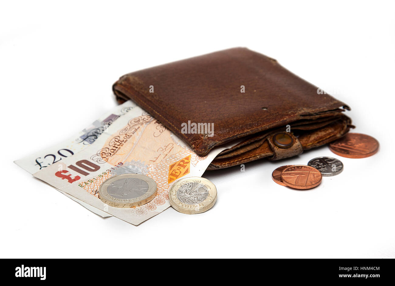 Brieftasche mit britischen Geld, Banknoten und Münzen Stockfoto