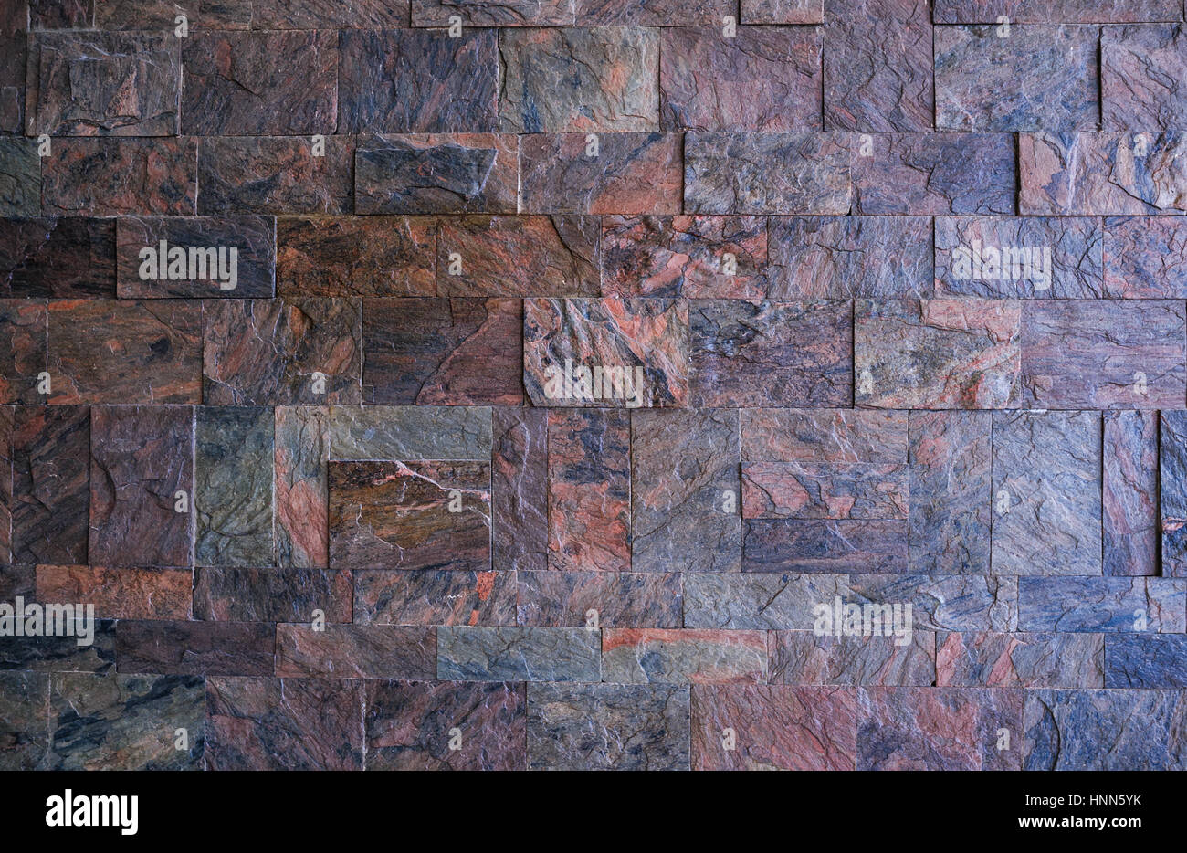 Strukturierte Wand aus Granit Stein Hintergrund Stockfoto