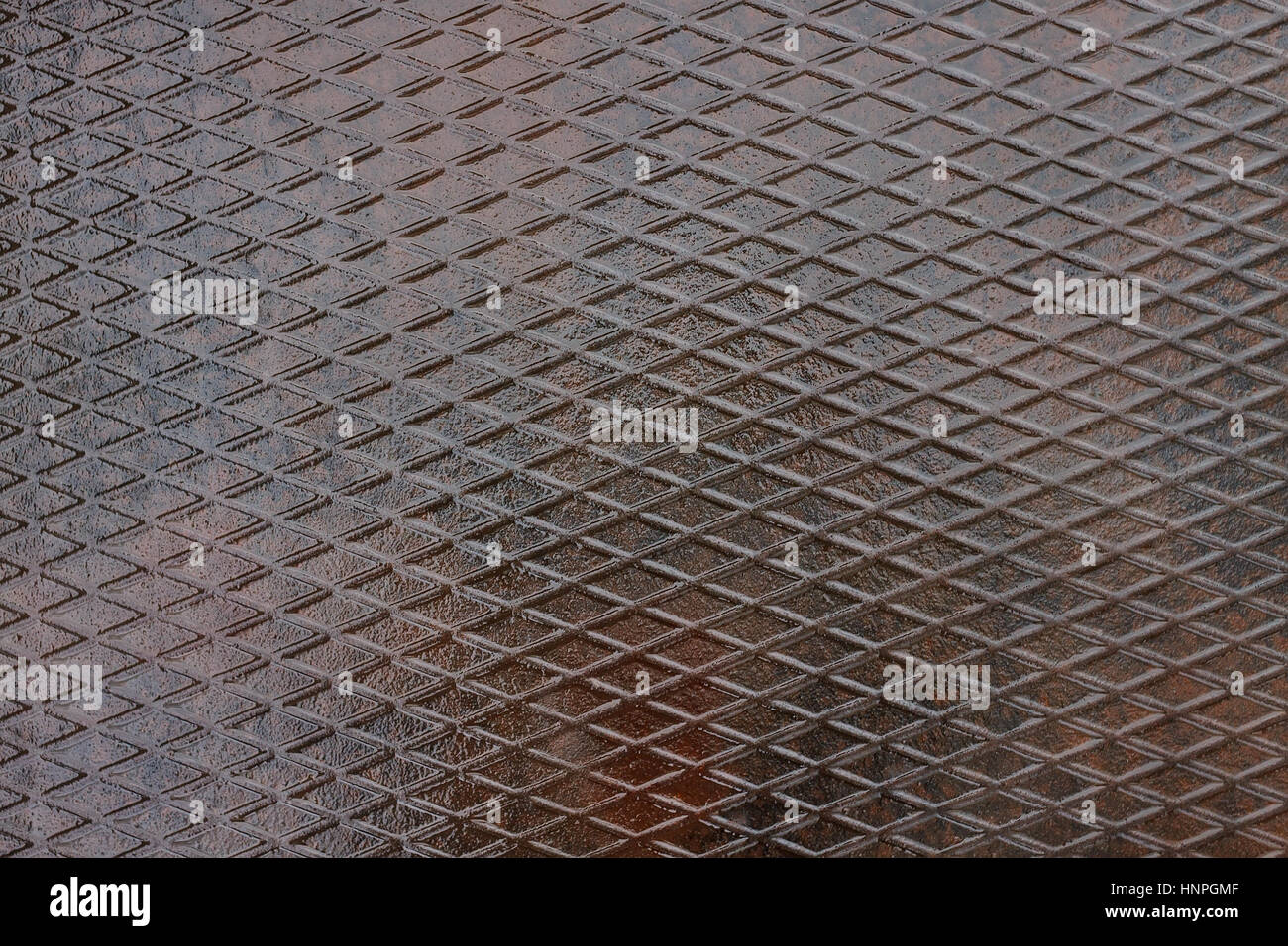 Grunge Metallplatte Hintergrund. Textur der Metallplatte mit Muster-Raster von Rauten. Metallwand. Metall Hintergrund Stockfoto