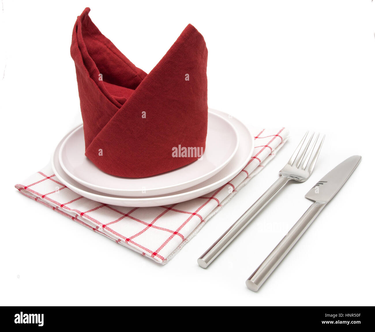 Abendessen auch Gabel und Messer auf roter Serviette Stockfoto