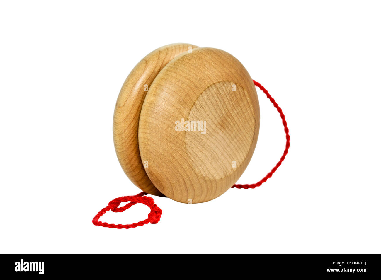 Holz Yoyo mit einer roten Schnur. isoliert. Stockfoto
