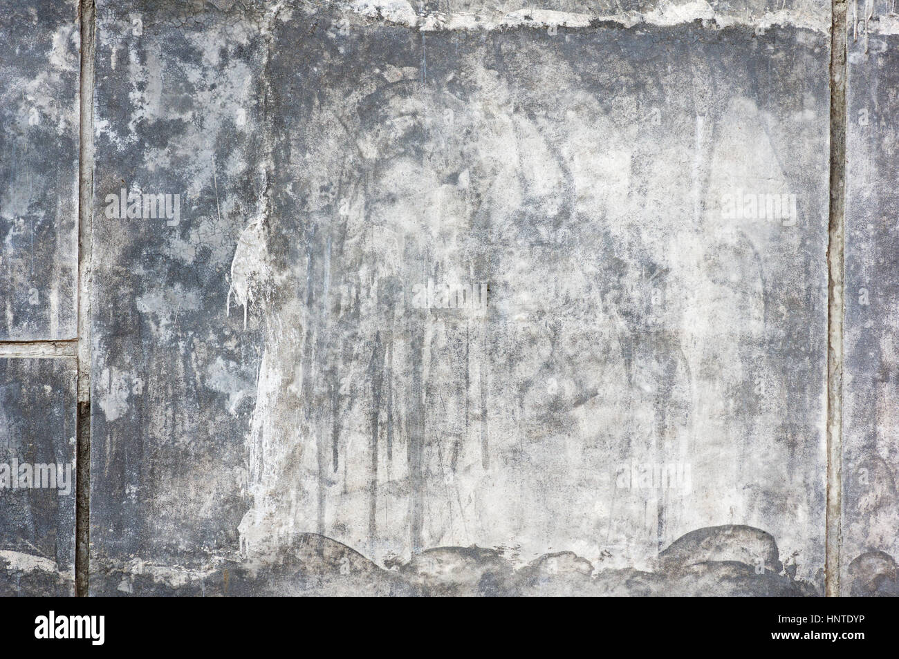 alten Betonwand mit Licht und dunkel grauer Farbe und Flecken Stockfoto