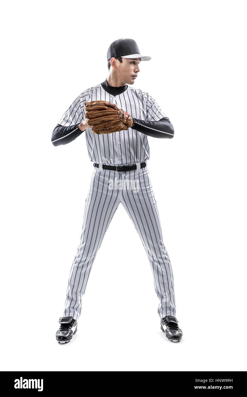 Baseball-Spieler mit Handschuh posiert Stockfoto