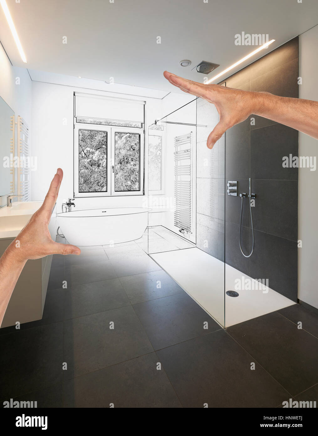 Geplante Sanierung ein modernes Luxus-Bad, Badewanne in Corian, Wasserhahn  und Dusche im Badezimmer mit Fenster zum Garten Stockfotografie - Alamy