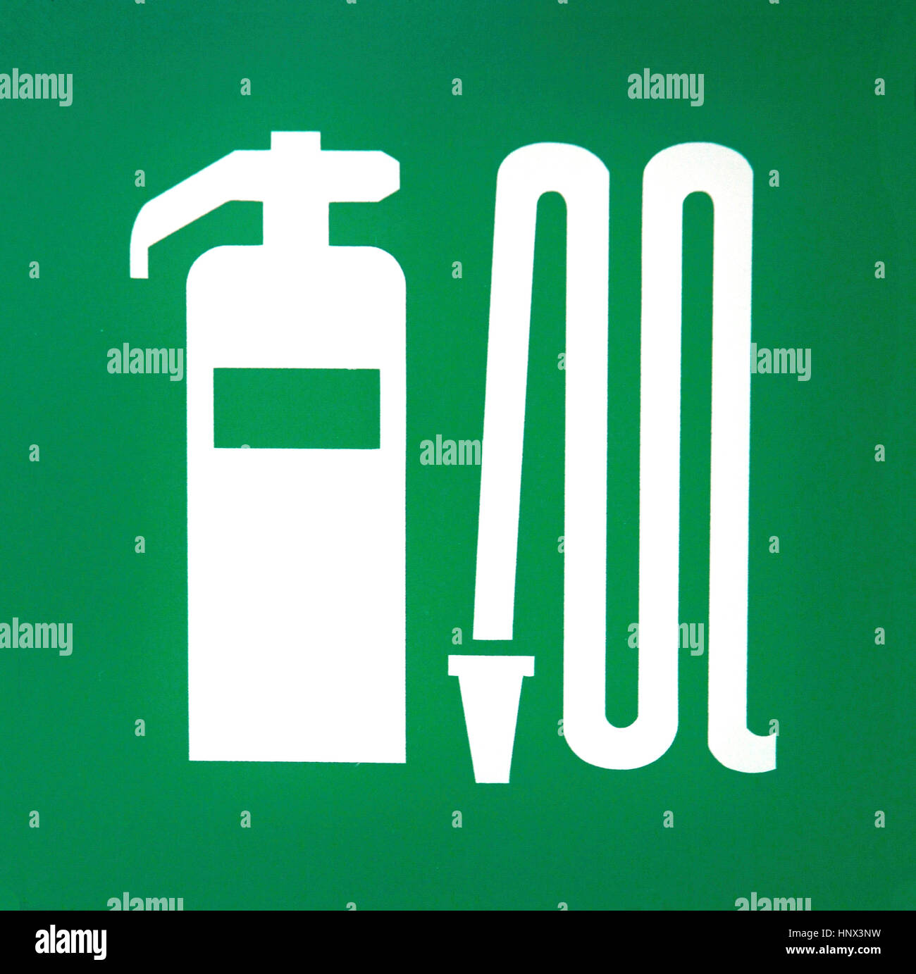 Feuerlöscher und Schlauch-Symbol Stockfoto