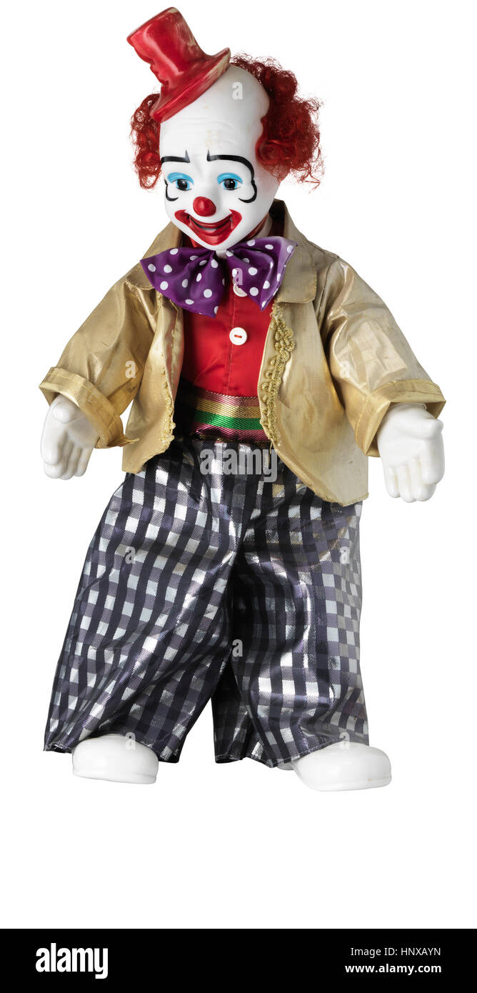 Clown-Puppe mit roten Hut und gefleckten Fliege Stockfoto