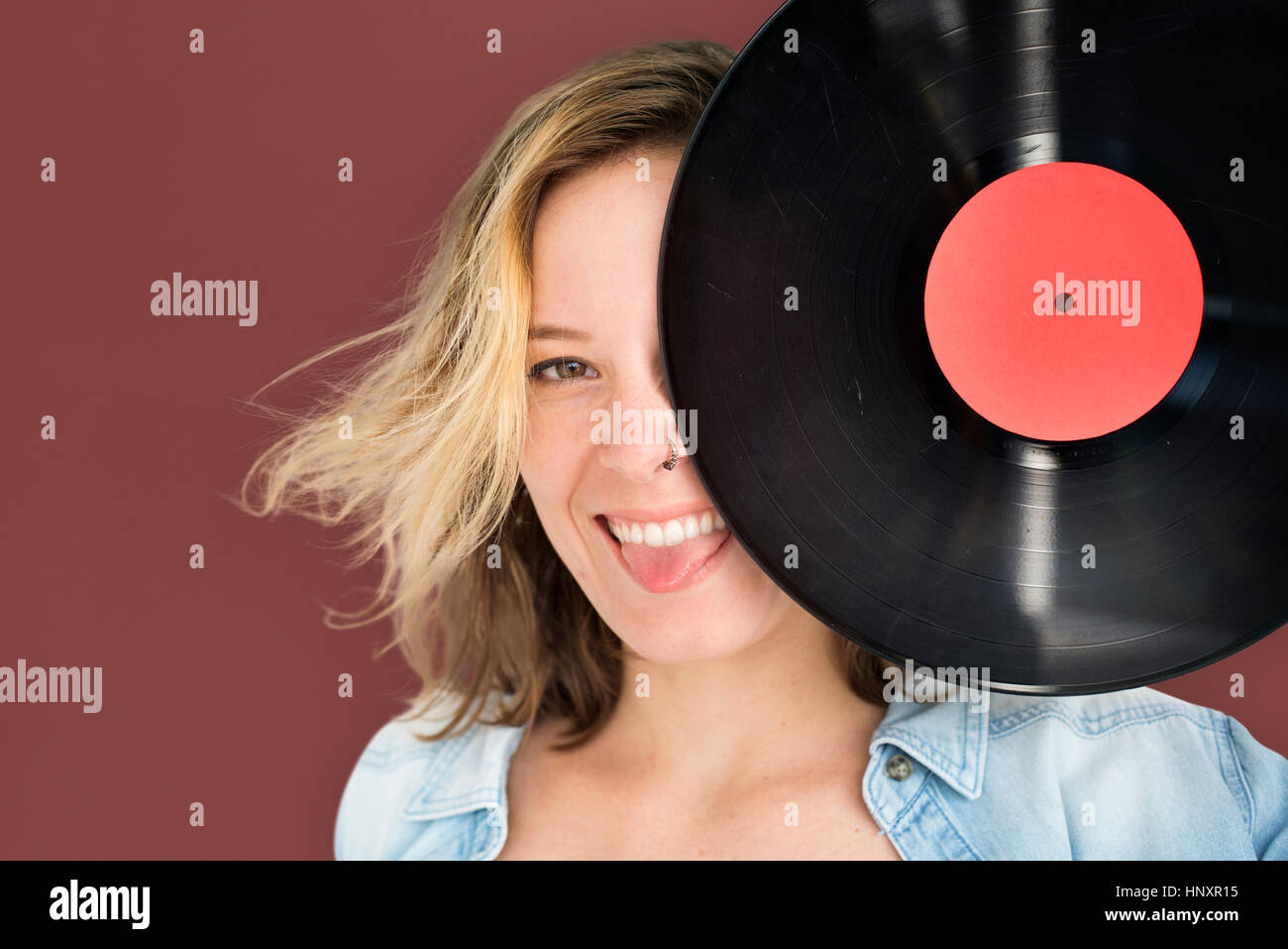 Kaukasische Lady Vintage Vinyl-Konzept Stockfoto