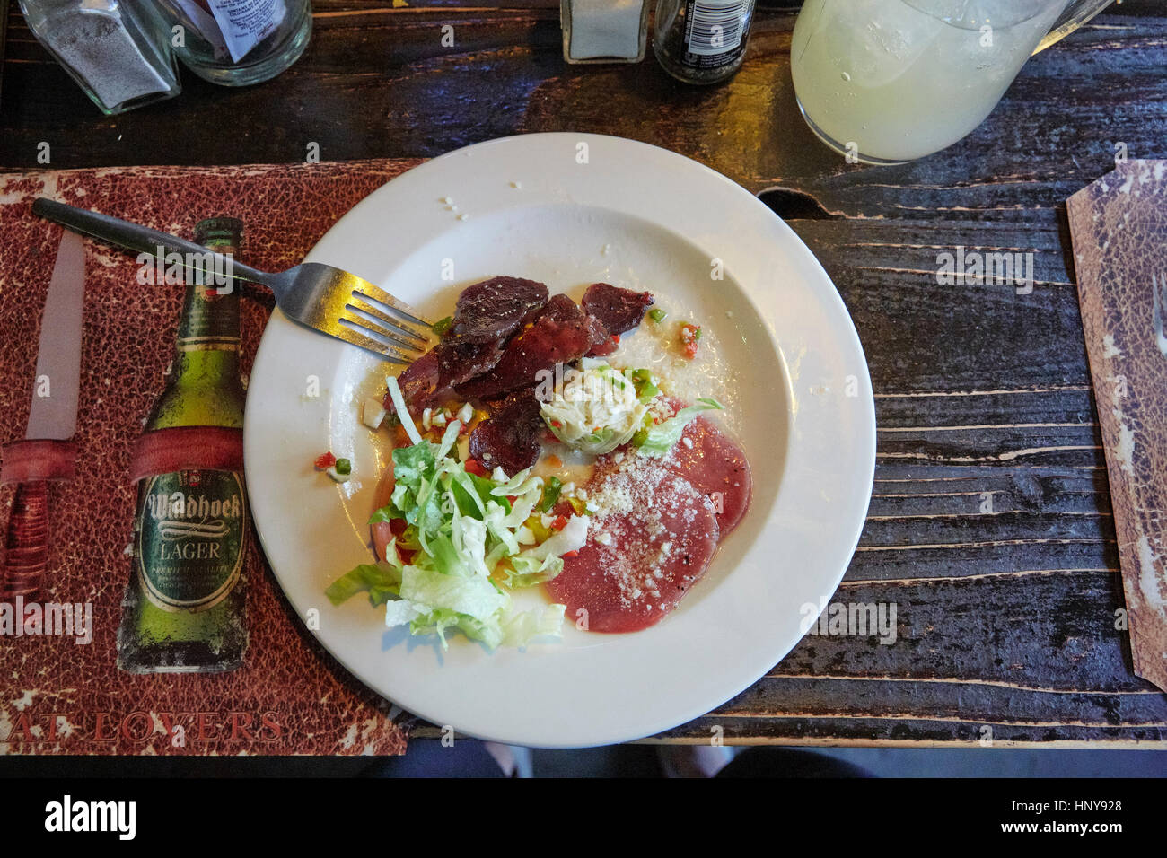 Oryx-Carpaccio, Spiel Essen an Joes Beerhouse Restaurant Bar und Pub, Windhoek, Namibia, Afrika Stockfoto