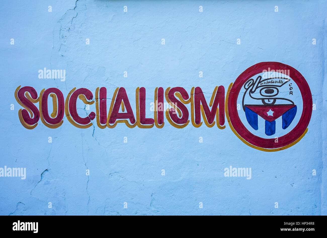 Politische Propaganda, Botschaft, gemalt auf einer Straßenmauer, La Habana, Kuba Stockfoto