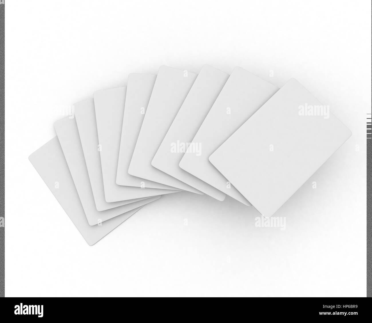 aufgefächert, weiße Karten auf weißem Hintergrund Stockfoto