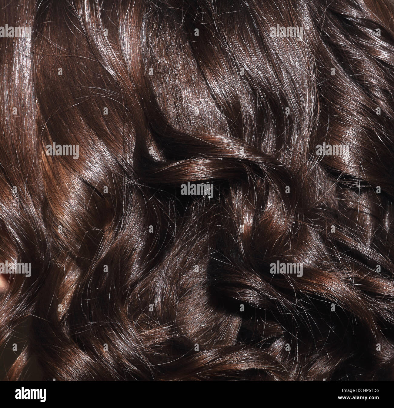 Schwarzes Haar Sperre Nahaufnahme. Schöne schwarze Haare. Schwarze Haare Hintergrund. Stockfoto