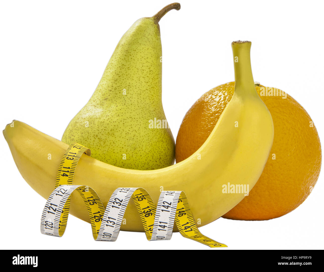 Banane, Birne und Orange mit Massband Stockfoto