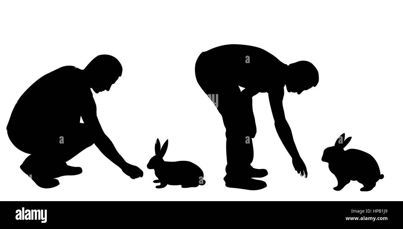 Silhouetten von Männern, die Fütterung von Kaninchen isoliert auf weiss Stockfoto