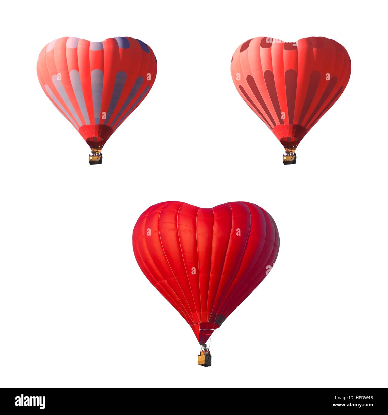 Gestreiften roten Luftballon in der Form eines Herzens isoliert auf einem weißen Hintergrund. Romantisches Date vorhanden Reise am Valentinstag. Sport und Freizeit t Stockfoto