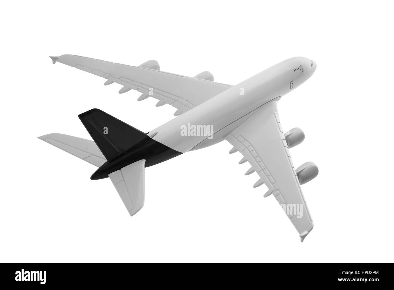 Flugzeug mit schwarzer Farbe, isoliert auf weißem Hintergrund. Stockfoto