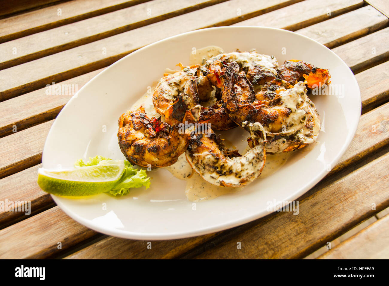 Languste bedeckt in Sauce Hollandaise Stockfoto