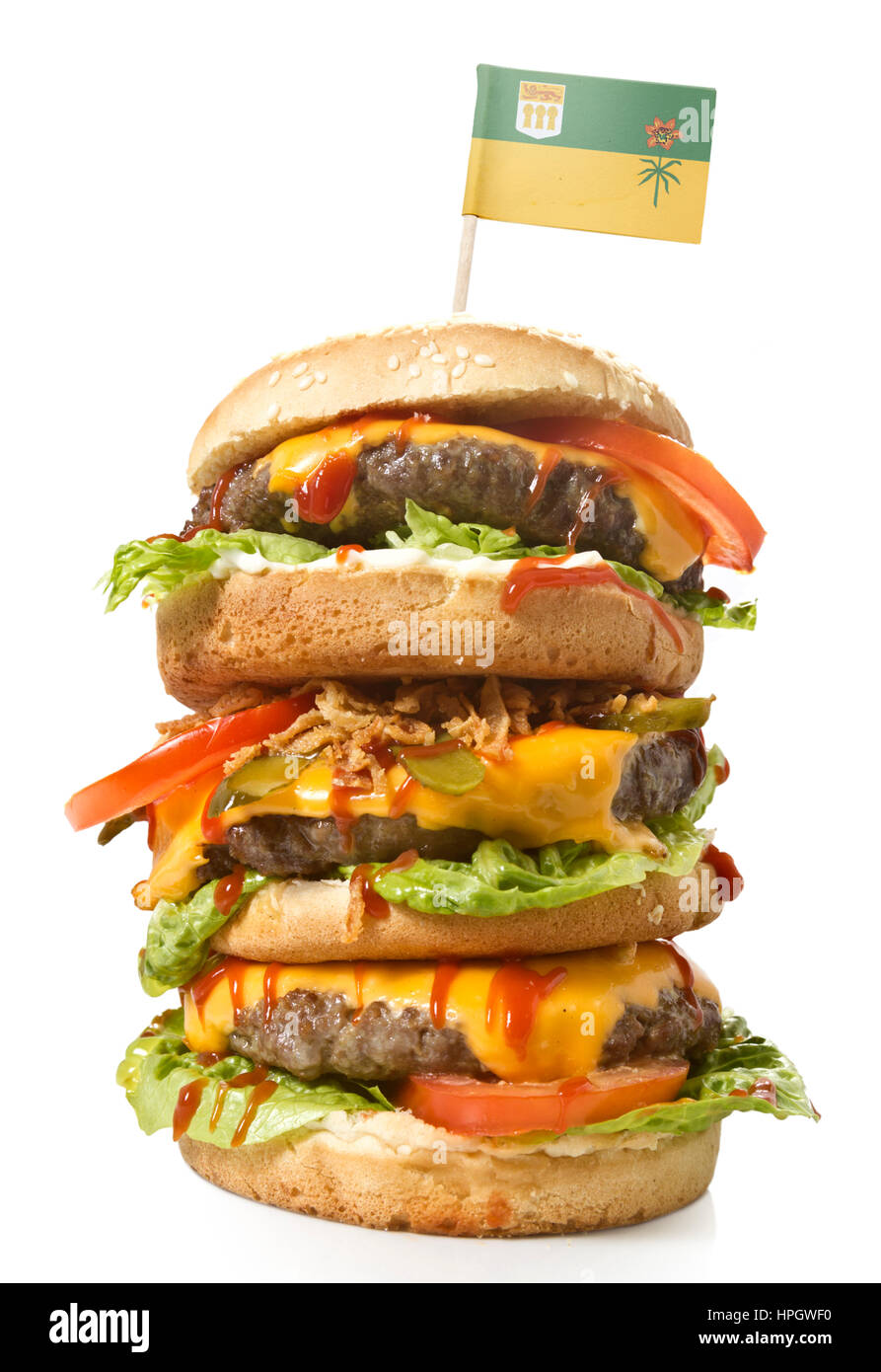 Frisch und lecker XXL Hamburger mit der Flagge von Saskatchewan. (Serie) Stockfoto