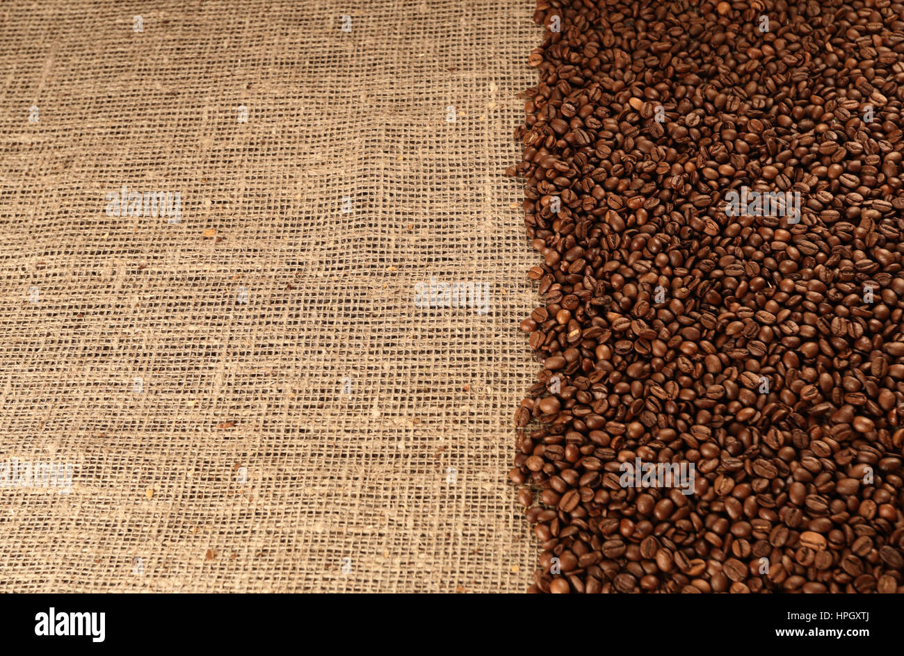 Kaffeebohnen-Hintergrund braun-big-bag Stockfoto