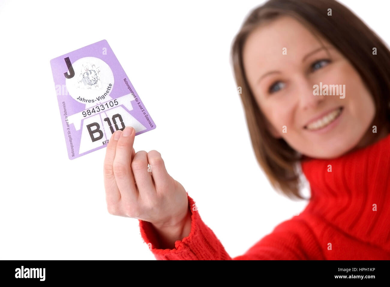 Model Release, Frau Mit Oesterreichischer Autobahnvignette 2010 - Frau mit österreichischen vignette Stockfoto