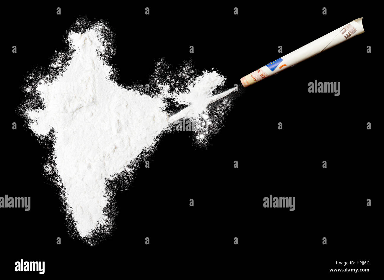 Ein Pulver-Drogen wie Kokain in Form von Indien mit einem gerollten Geldschein. (Serie) Stockfoto