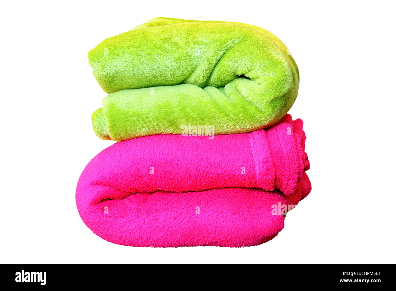 Stapel von bunten Decken, rosa und grün, isoliert über weiße, Objekte für Ihr design Stockfoto
