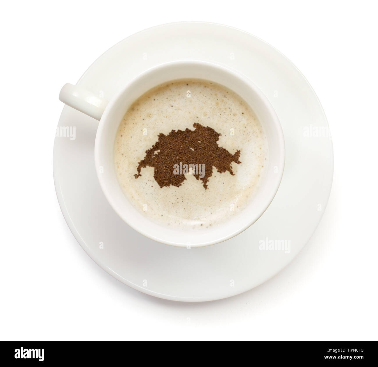 Eine Tasse Kaffee mit Schaum und Pulver in der Form der Schweiz. (Serie  Stockfotografie - Alamy