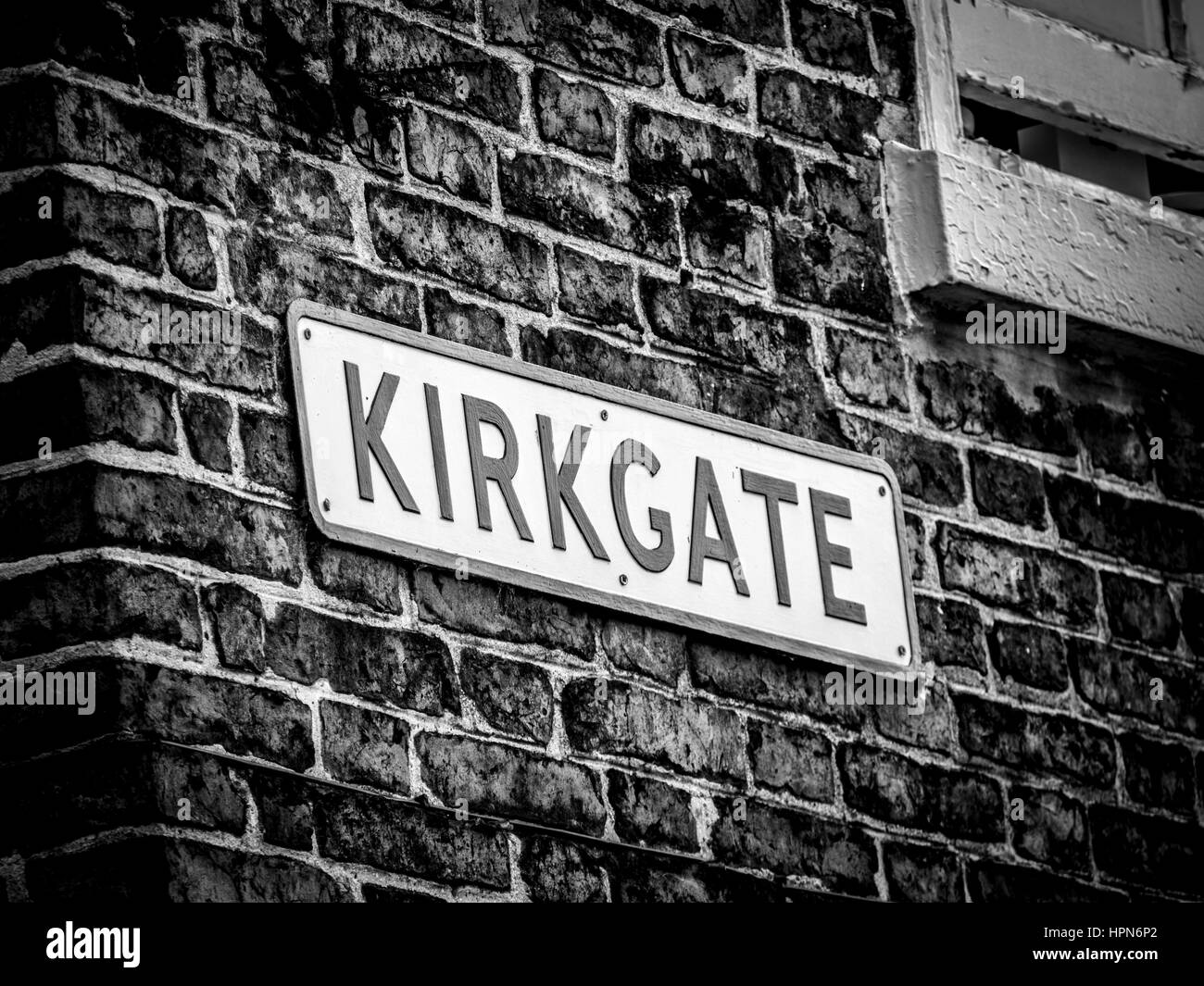 Kirkgate Straßenschild, Thirsk, North Yorkshire, UK. Stockfoto