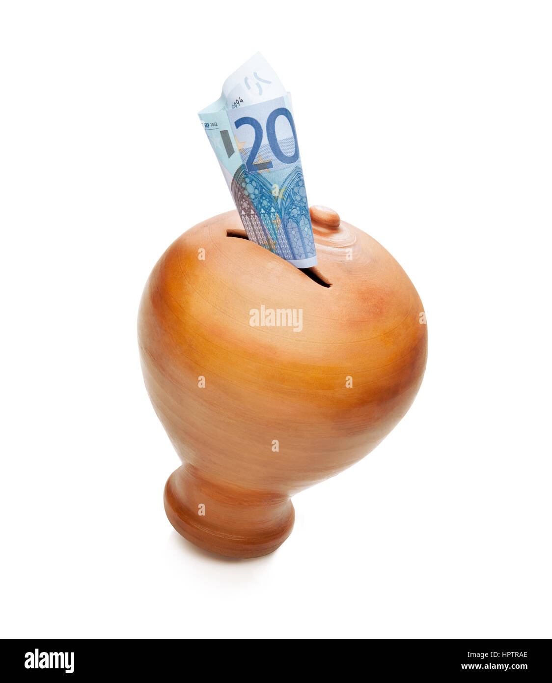 Goldene Spardose. Zwanzig Euro Rechnung in einem Banking-Konzept Stockfoto