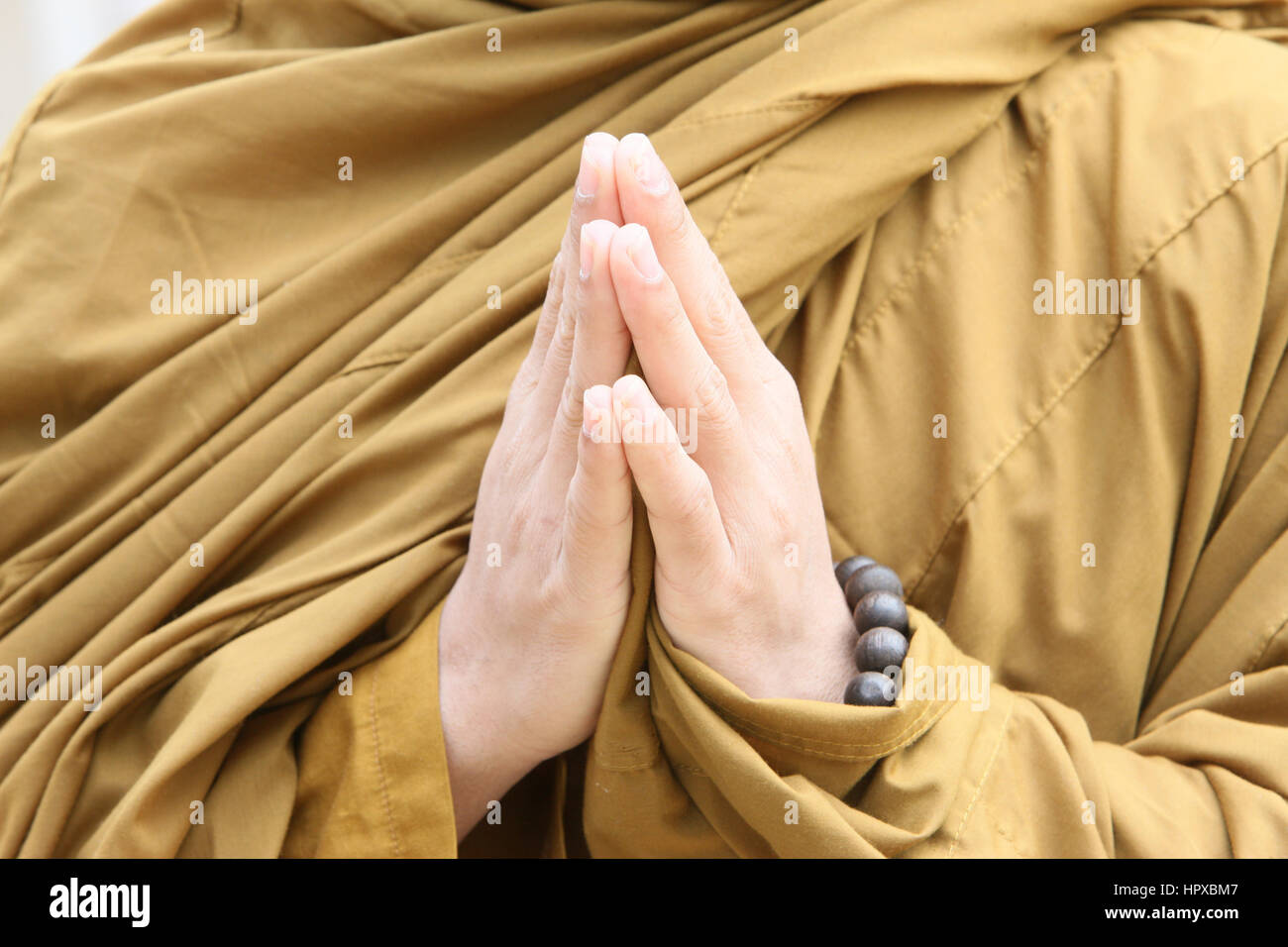Buddhistischer Mönch, Hände. Stockfoto