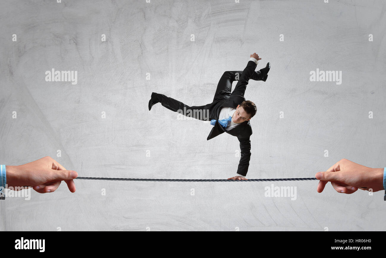 Junger Geschäftsmann Breakdancer. Mixed-media Stockfoto