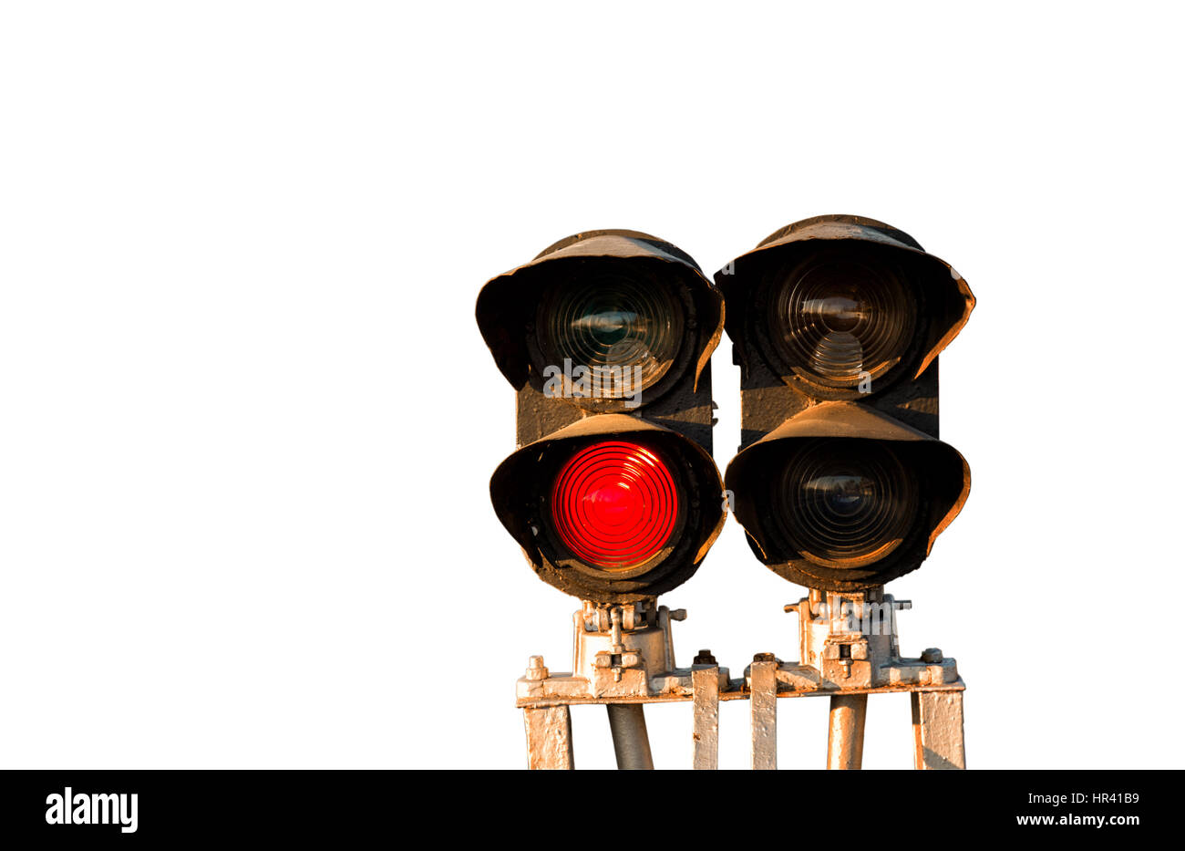 Ampel zeigt rotes Signal auf Bahn isoliert auf weißem Hintergrund Stockfoto