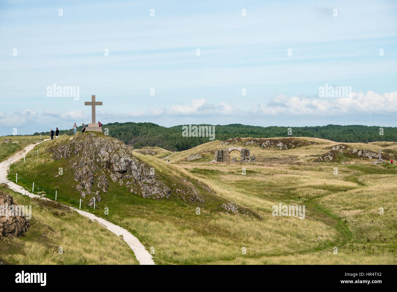 St Dwynwen Kreuz, Llanddwyn Island in Anglesey, Nordwales Stockfoto