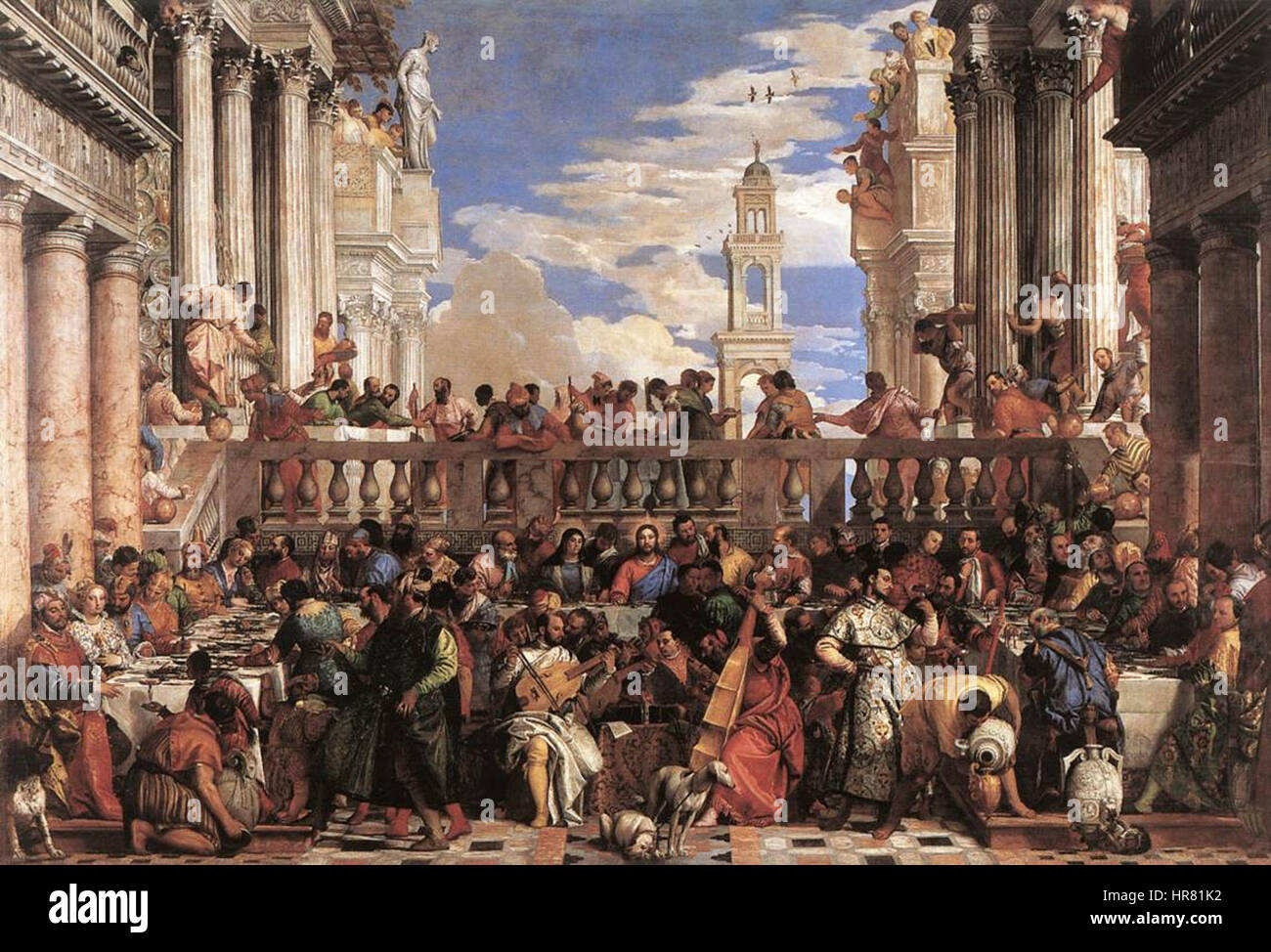 Dieses Werk von Paolo Veronese zeigt die Hochzeit in Kana, wo Jesus sein erstes Wunder vollbrachte, indem er Wasser in Wein verwandelte. Das Gemälde ist eine lebendige Darstellung des biblischen Ereignisses und zeigt Veroneses Meisterschaft von Farbe, Komposition und Detail im venezianischen Stil des 16. Jahrhunderts. Stockfoto