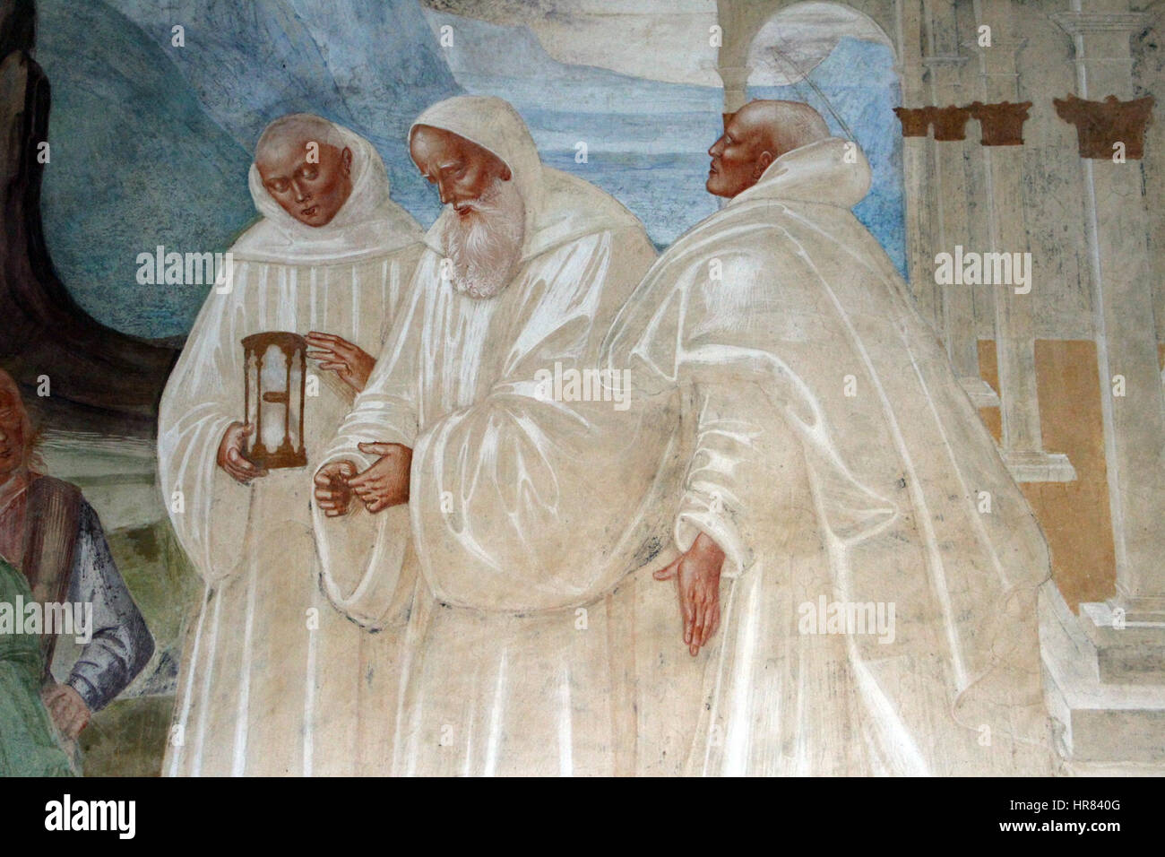 „Geschichte di S. Benedetto, 22“ von Luca Signorelli zeigt den heiligen Benedikt, der die Einwohner von Montecassino evangelisiert. Dieses Fresko ist Teil der Serie, die das Leben und die Lehren des heiligen veranschaulicht. Signorellis detaillierter Stil betont die dramatischen Momente spiritueller Transformation, die mit leuchtenden Farben und klaren Figuren festgehalten werden, die den religiösen Eifer der Renaissance widerspiegeln. Stockfoto