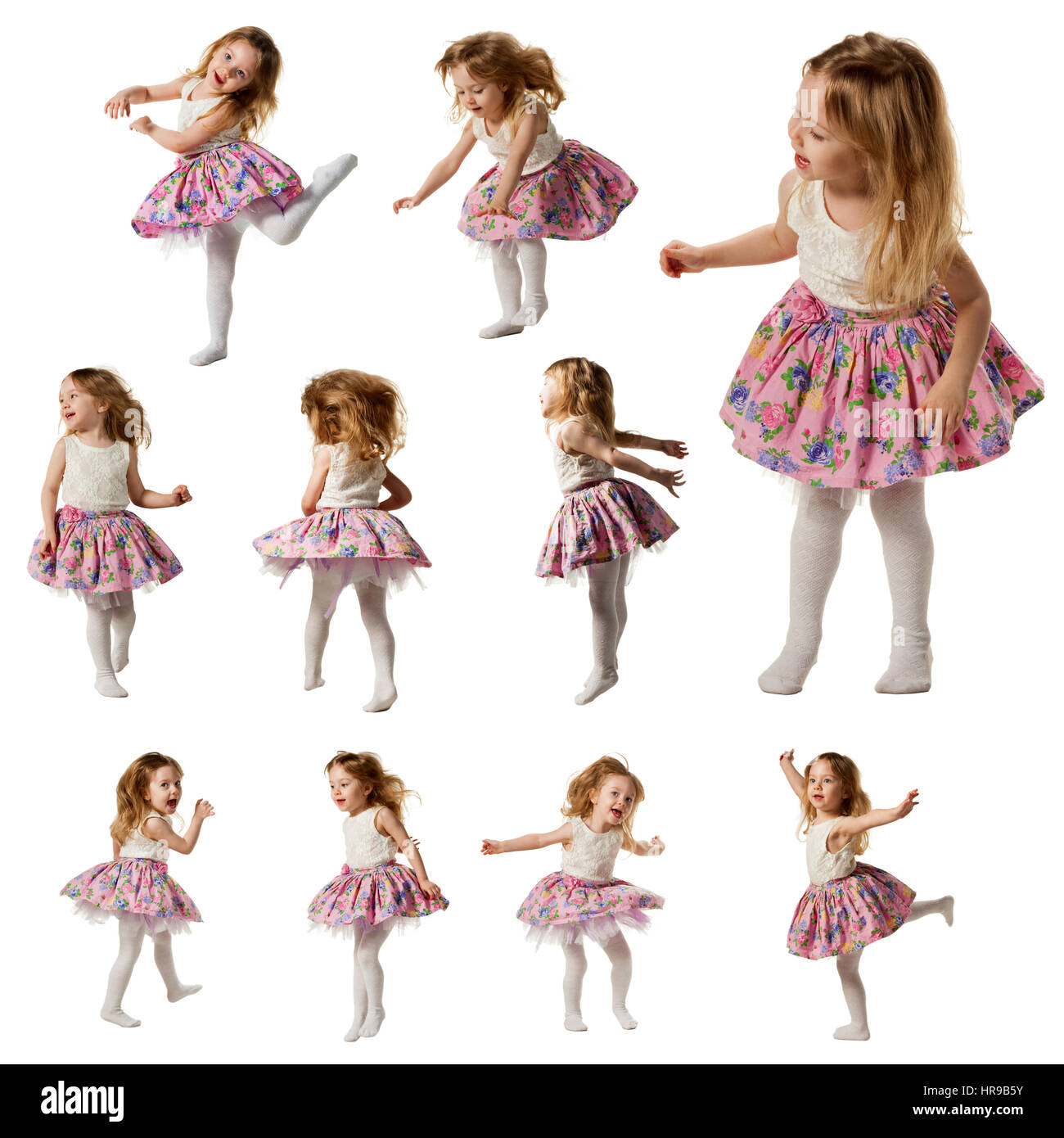 Niedliche kleine Mädchen Lied singen und tanzen, isoliert auf weiss ist Stockfoto