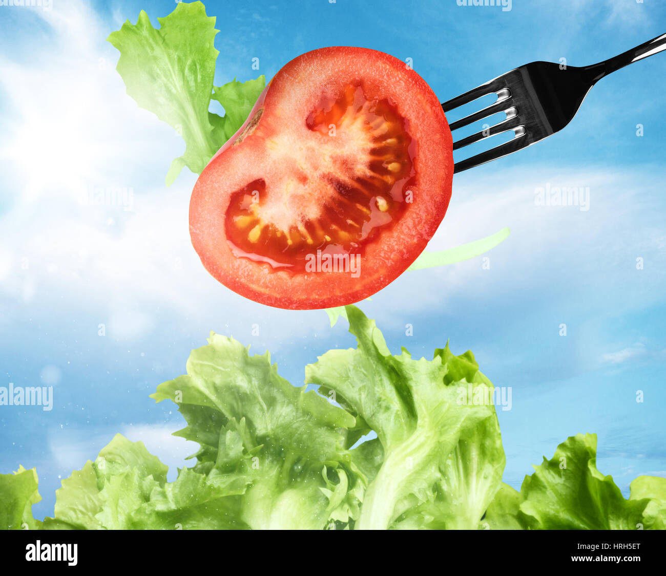 Hintergrund der gemischte Salat mit einer Gabel Stockfoto