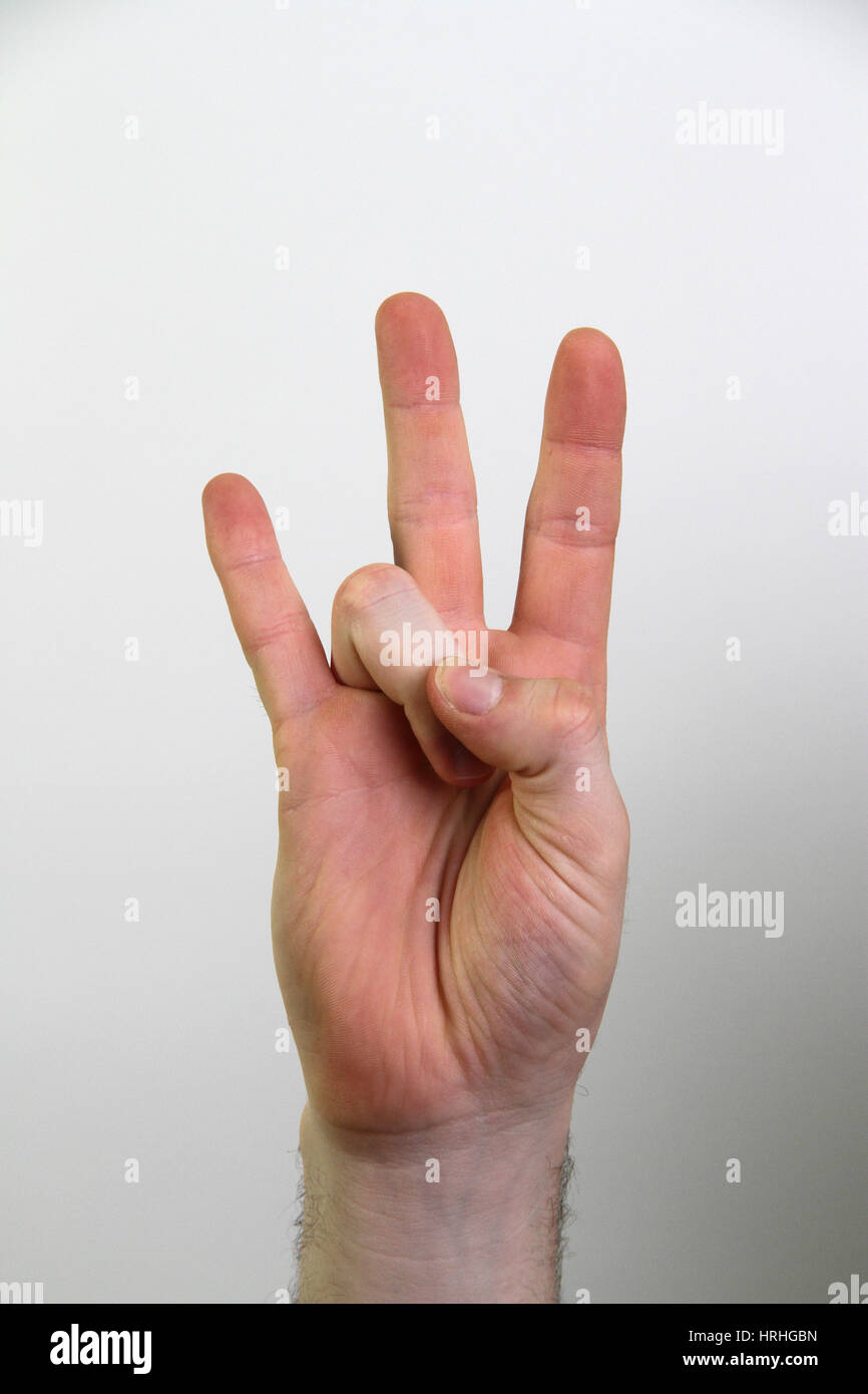 Hand, die Unterzeichnung der Zahl sieben Stockfoto
