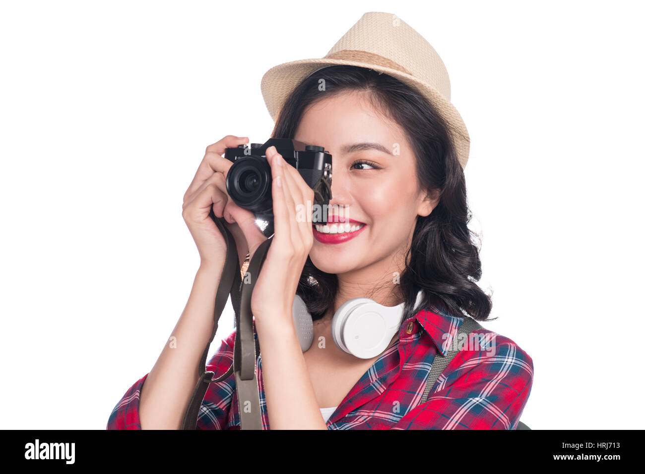Frau reisen. Junge schöne asiatische Frau Reisenden fotografieren auf blauem Hintergrund Stockfoto
