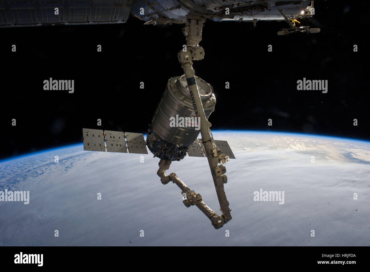 Cygnus Canadarm2 befestigt Stockfoto