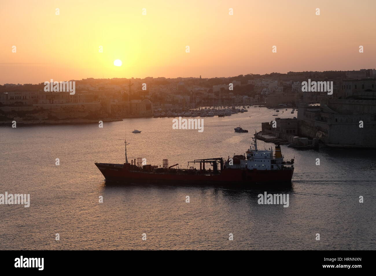 Sonnenaufgang am Grand Harbour, Valletta, Malta Stockfoto