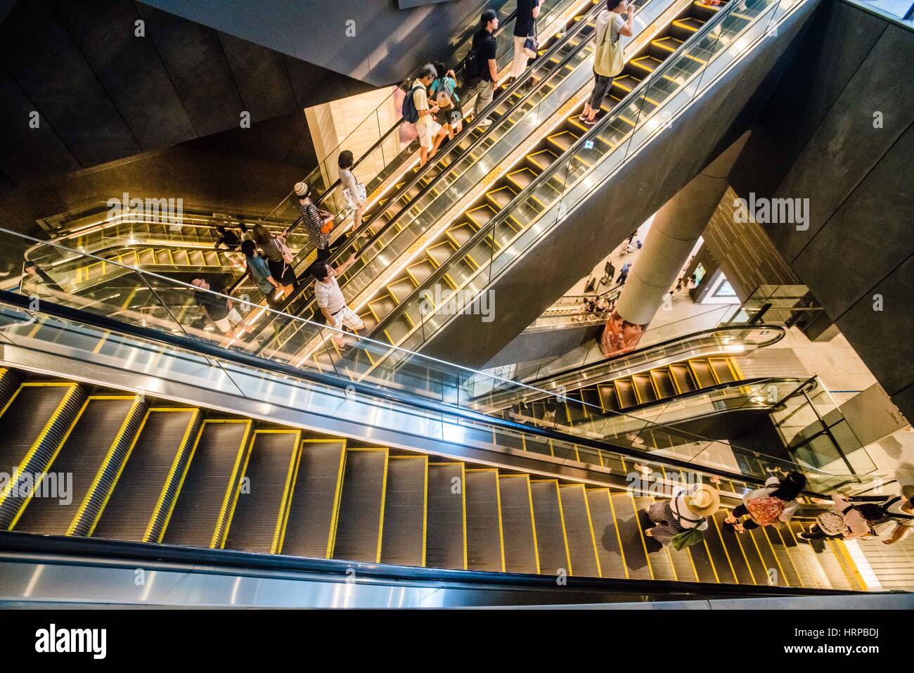 Menschen mit Rolltreppen. Stockfoto