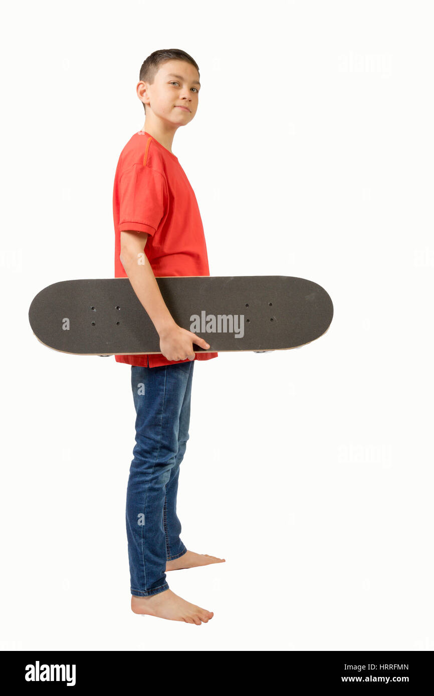 Kaukasische junge Teenager mit seinem skateboard Stockfoto