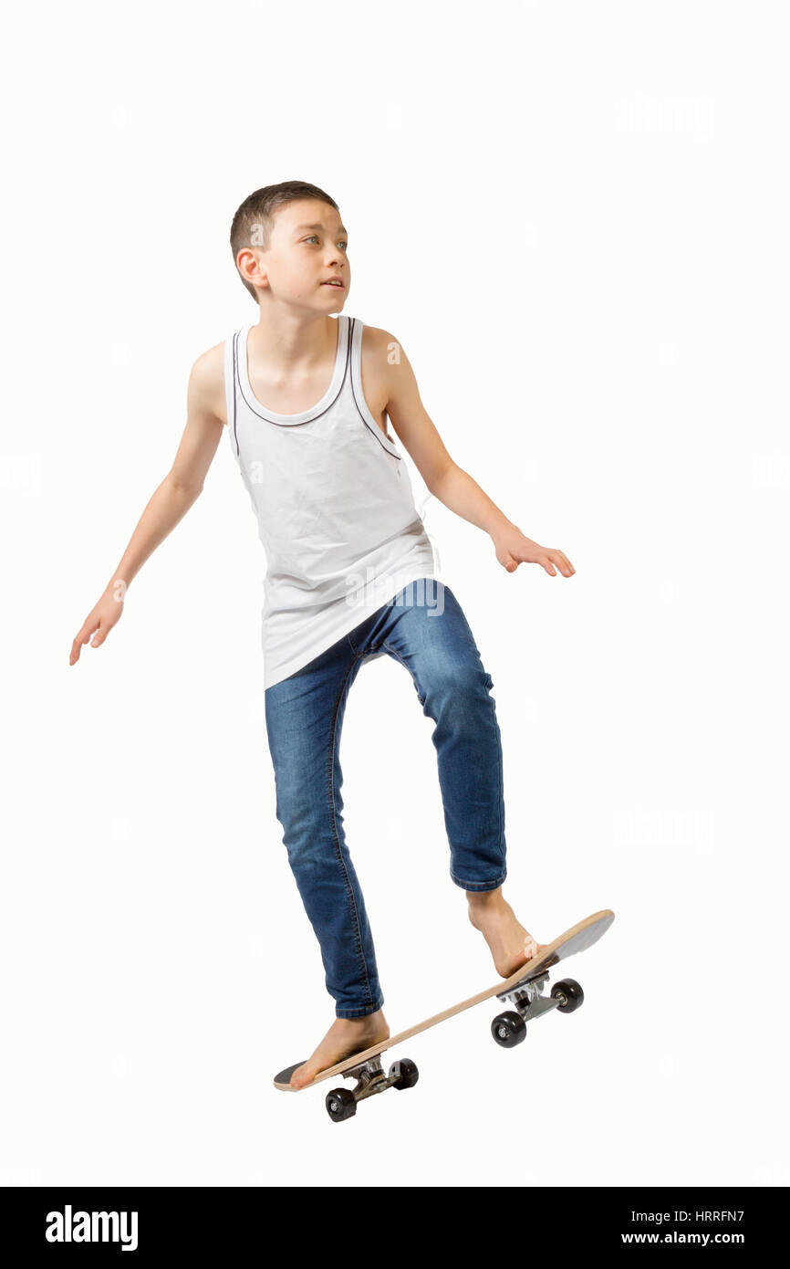 Kaukasische junge Teenager mit seinem skateboard Stockfoto