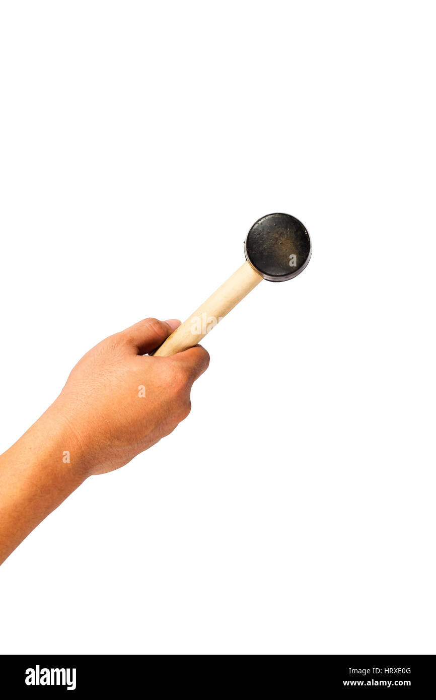 Hand mit einem Hammer auf einem weißen Hintergrund. Ansicht von oben Stockfoto