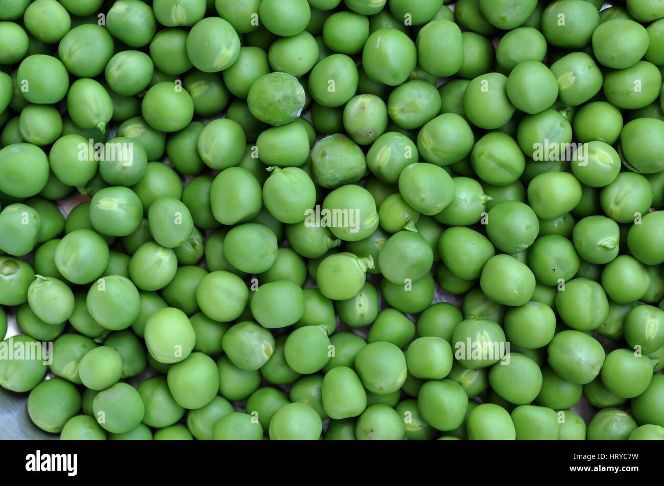Frische grüne Erbsen Hintergrundtextur Stockfoto