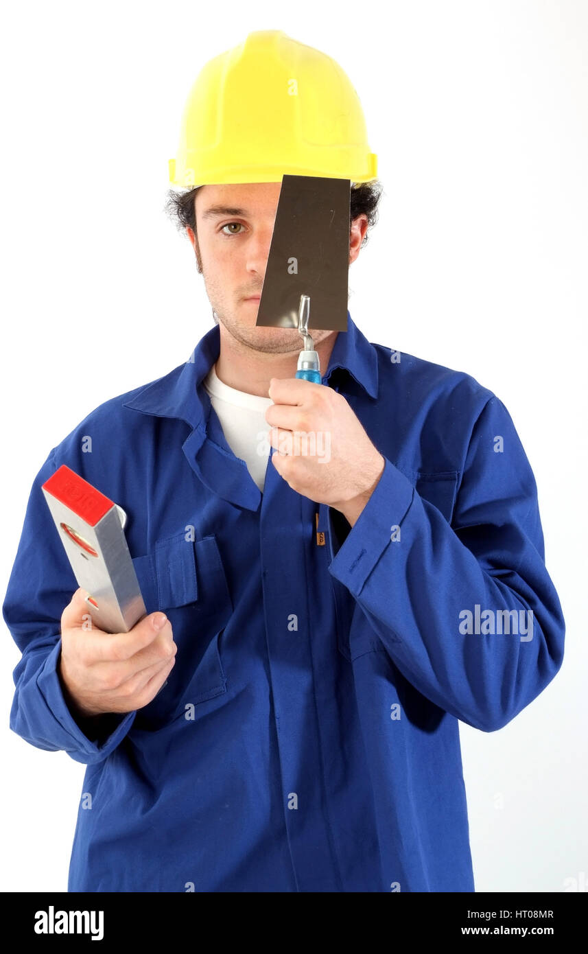 Bauarbeiter Mit Blaumann, Bauhelm Und Werkzeug - Bauarbeiter mit Werkzeugen Stockfoto
